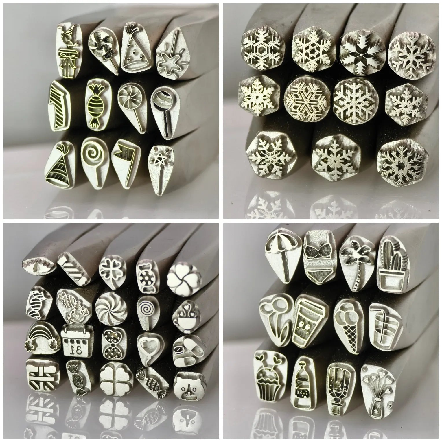 Collection of various metal stamps with different designs on a reflective surface.