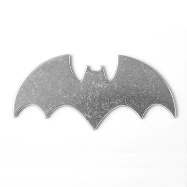Metallic bat-shaped object on a white background MetalStampingBlank
