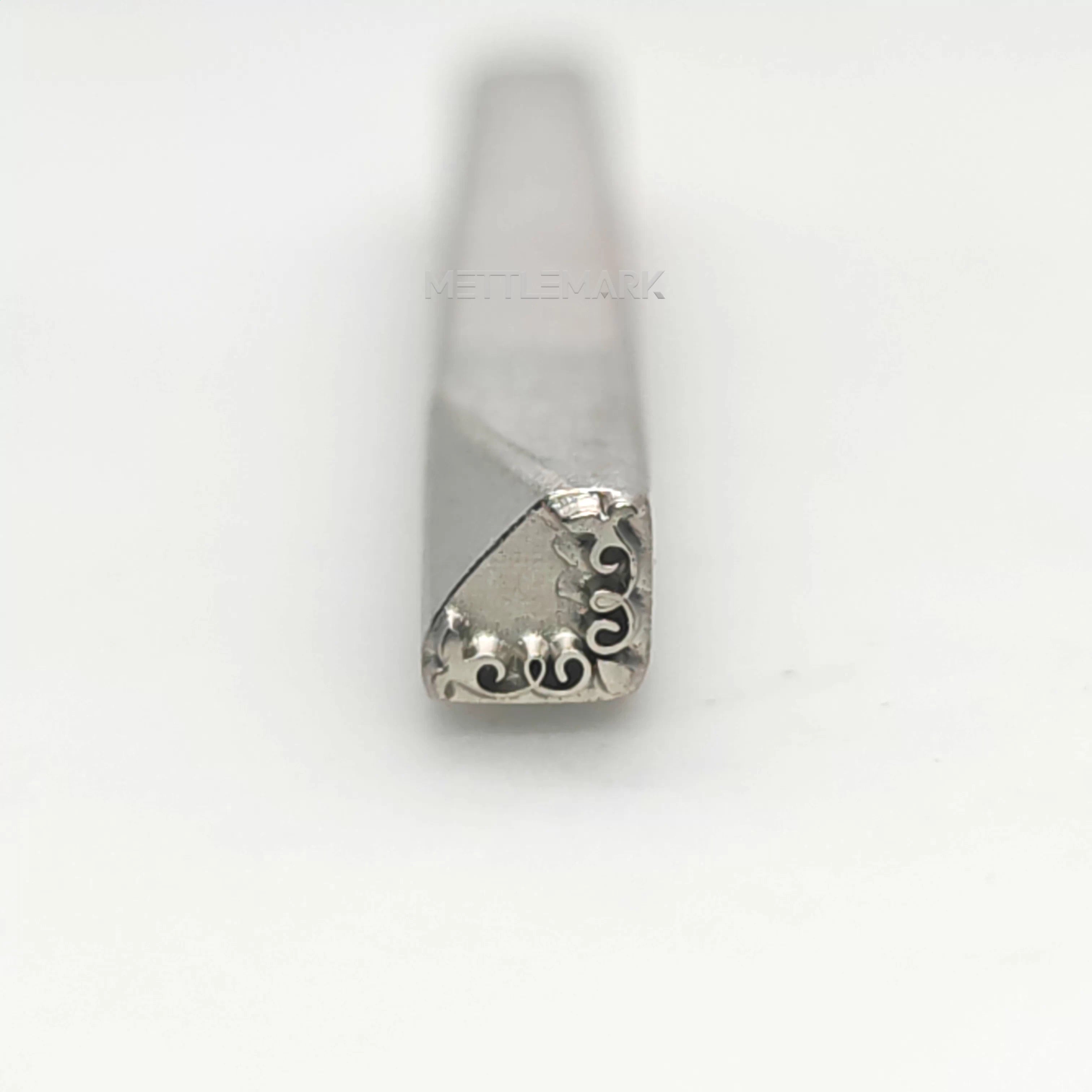 Metal stamping tool with etalStampBordersRightAngleDecoration
