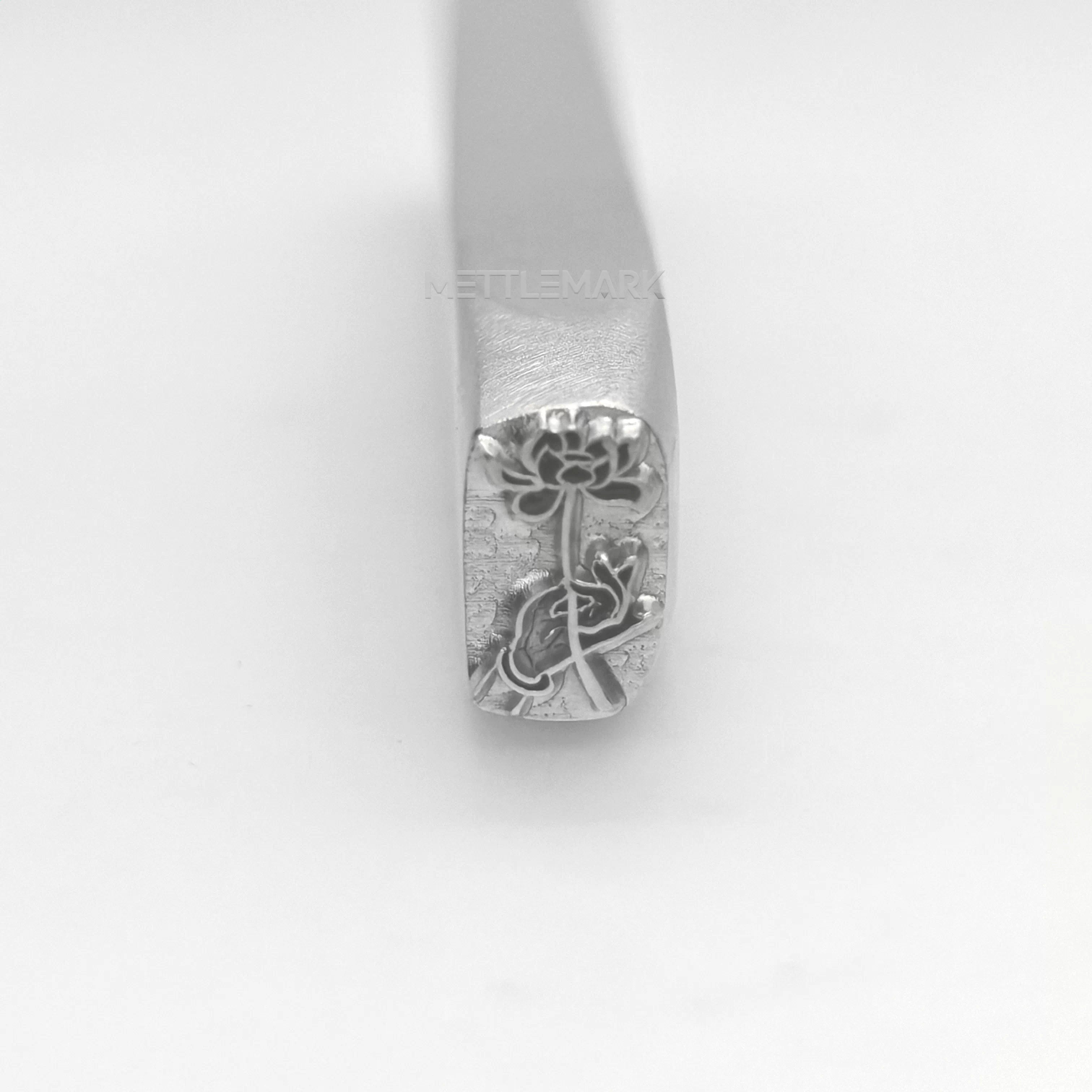 Metal stamp with Holding a lotus flower