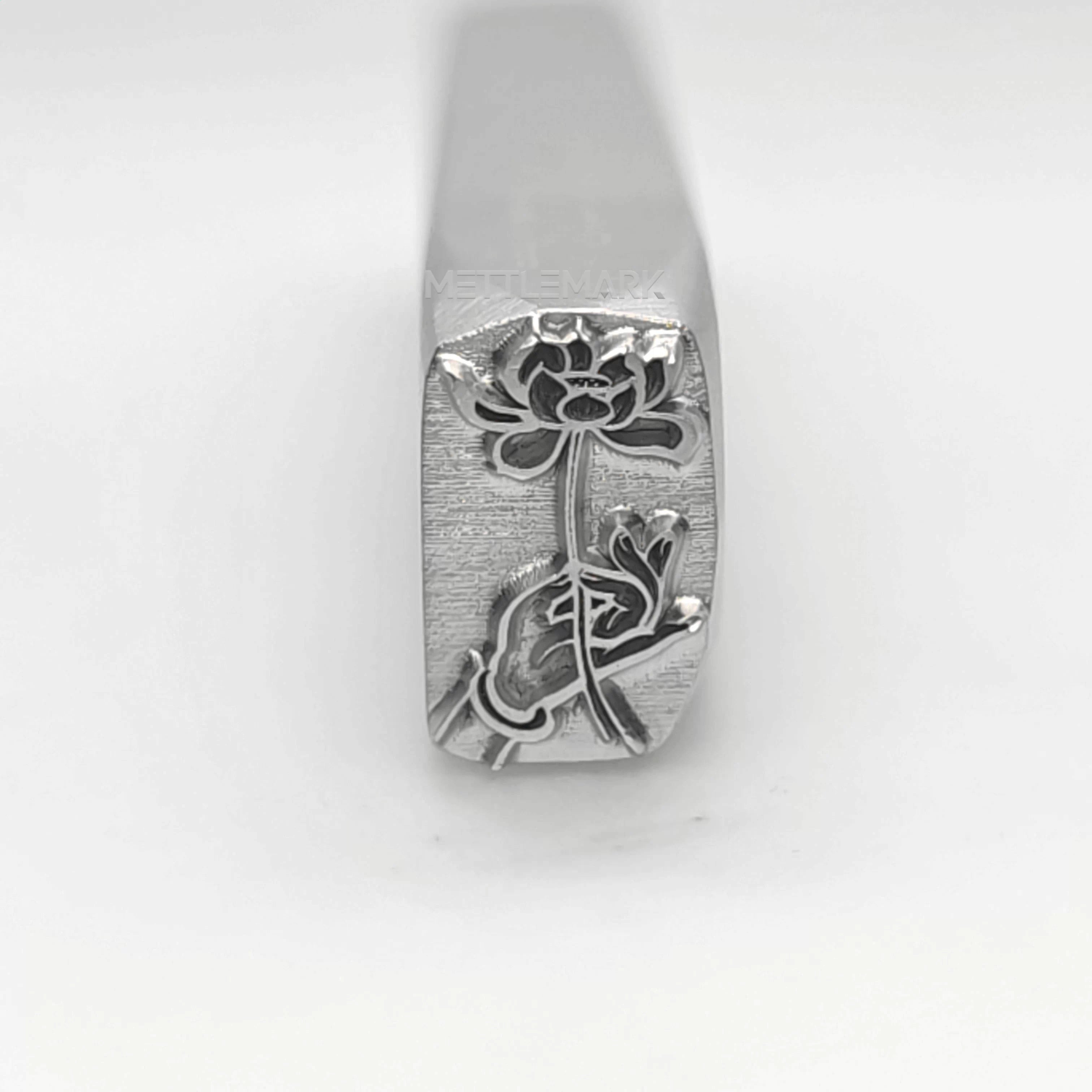 Metal stamp with Holding a lotus flower