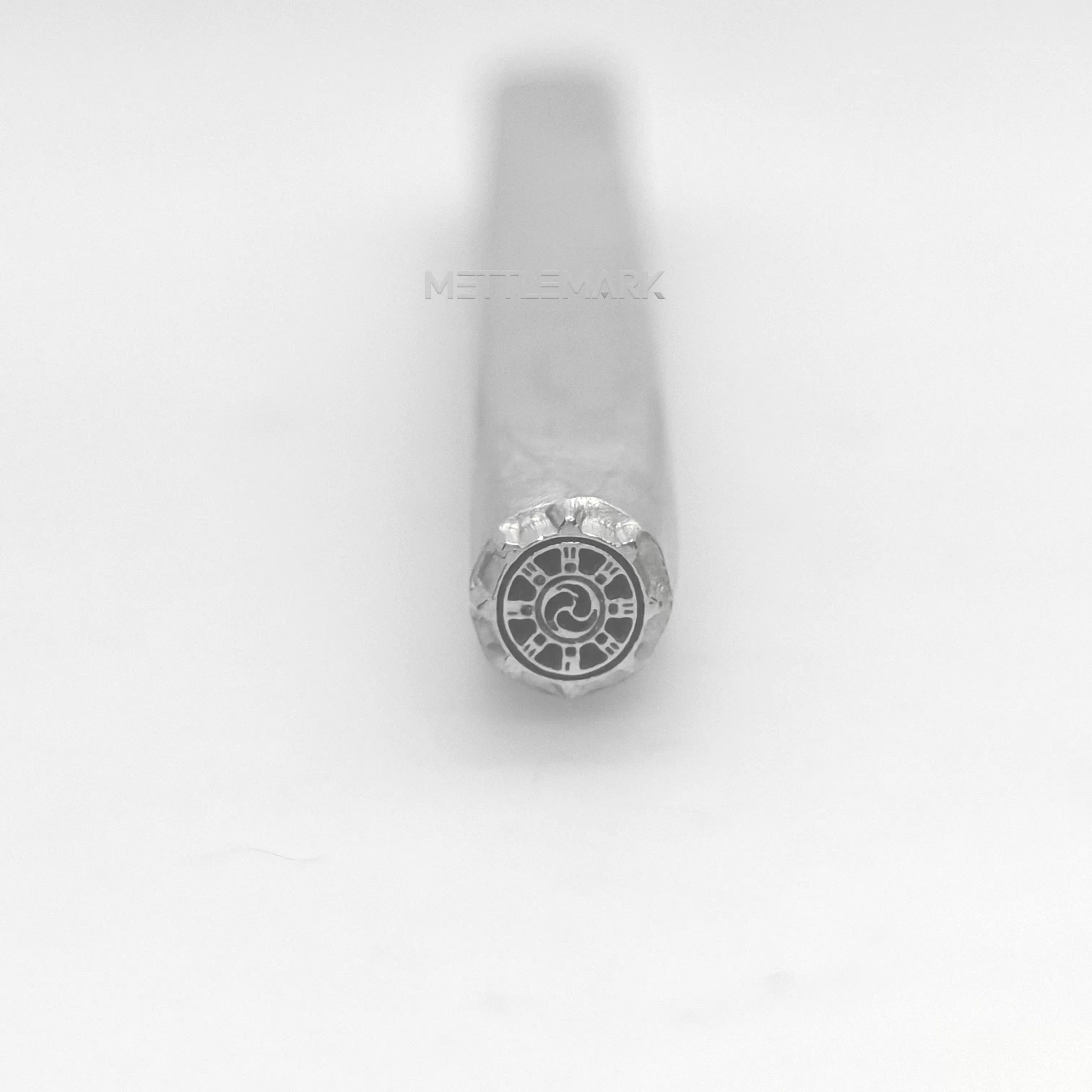 Metal stamp with Buddhism Dharma Wheel