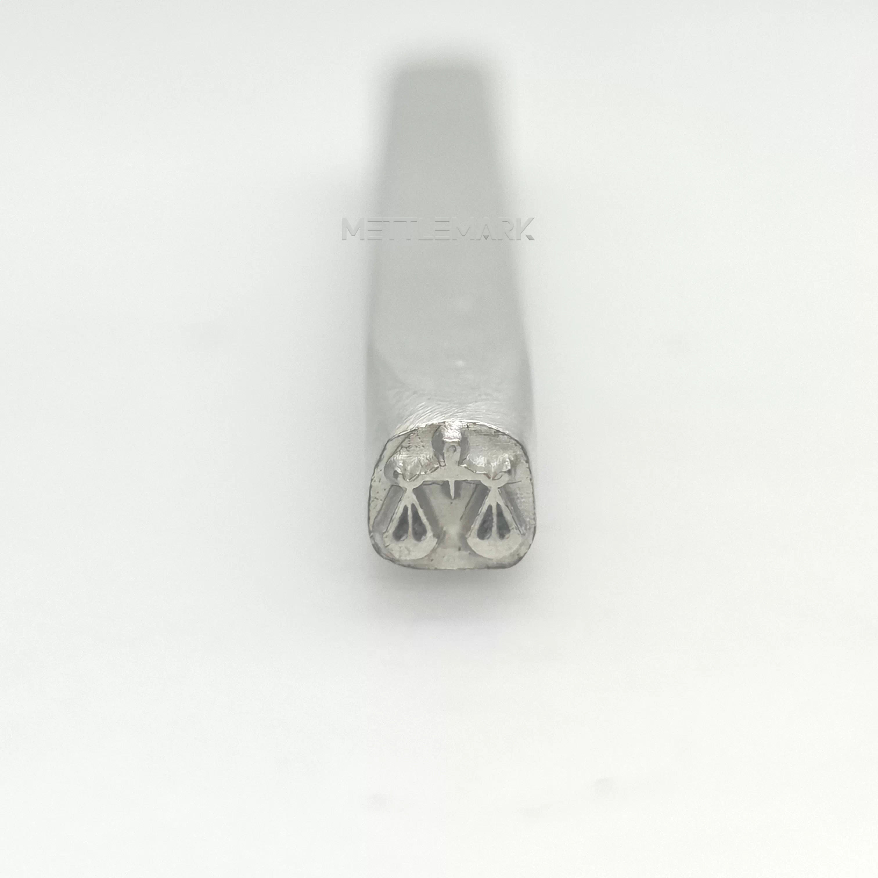 Metal stamp with Balance