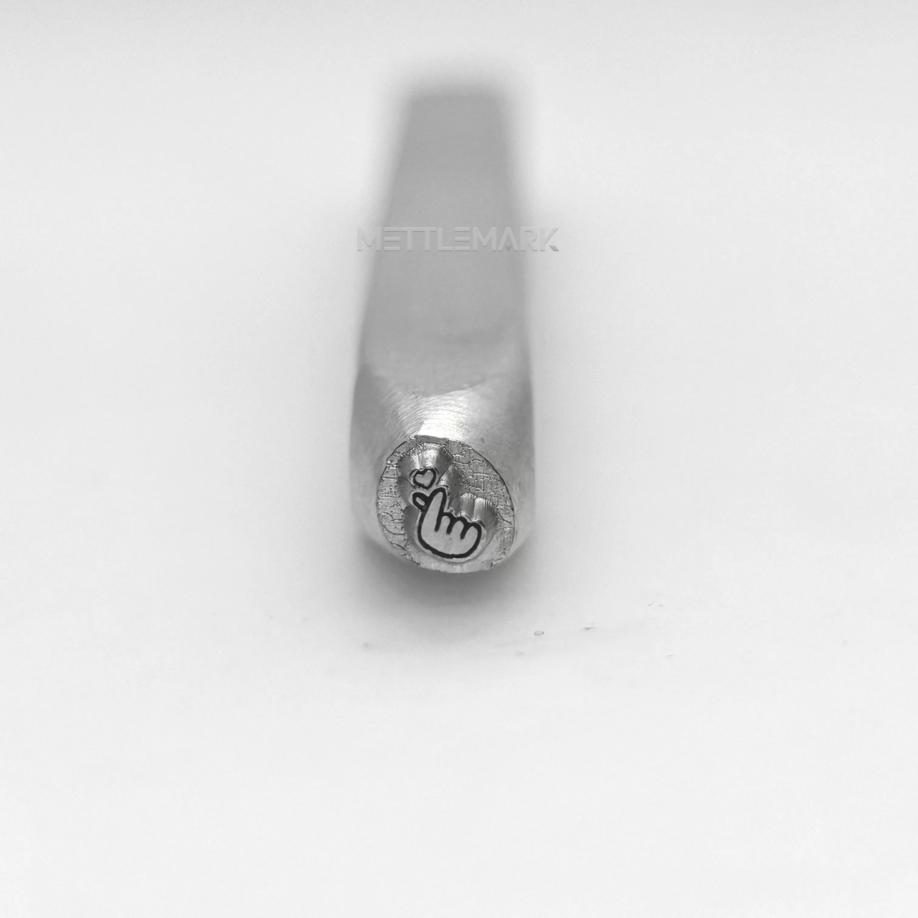 Metal stamping tool with EmojisHeartSymbolMetal