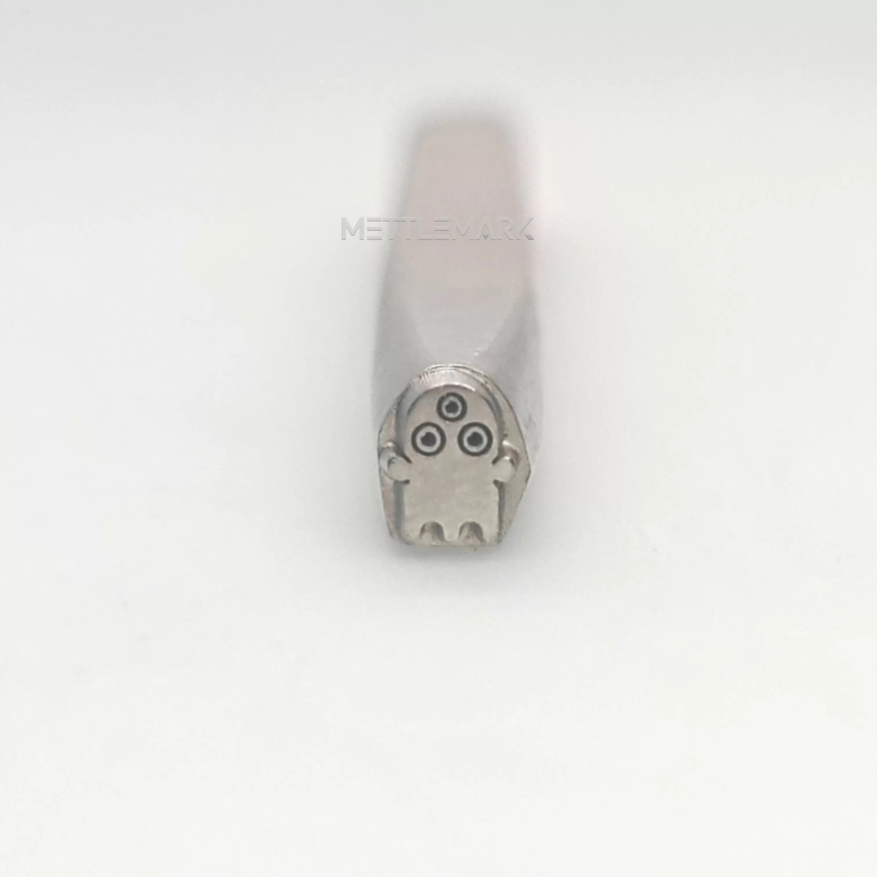 Metal stamping tool with a HalloweenThree-EyedGhost design