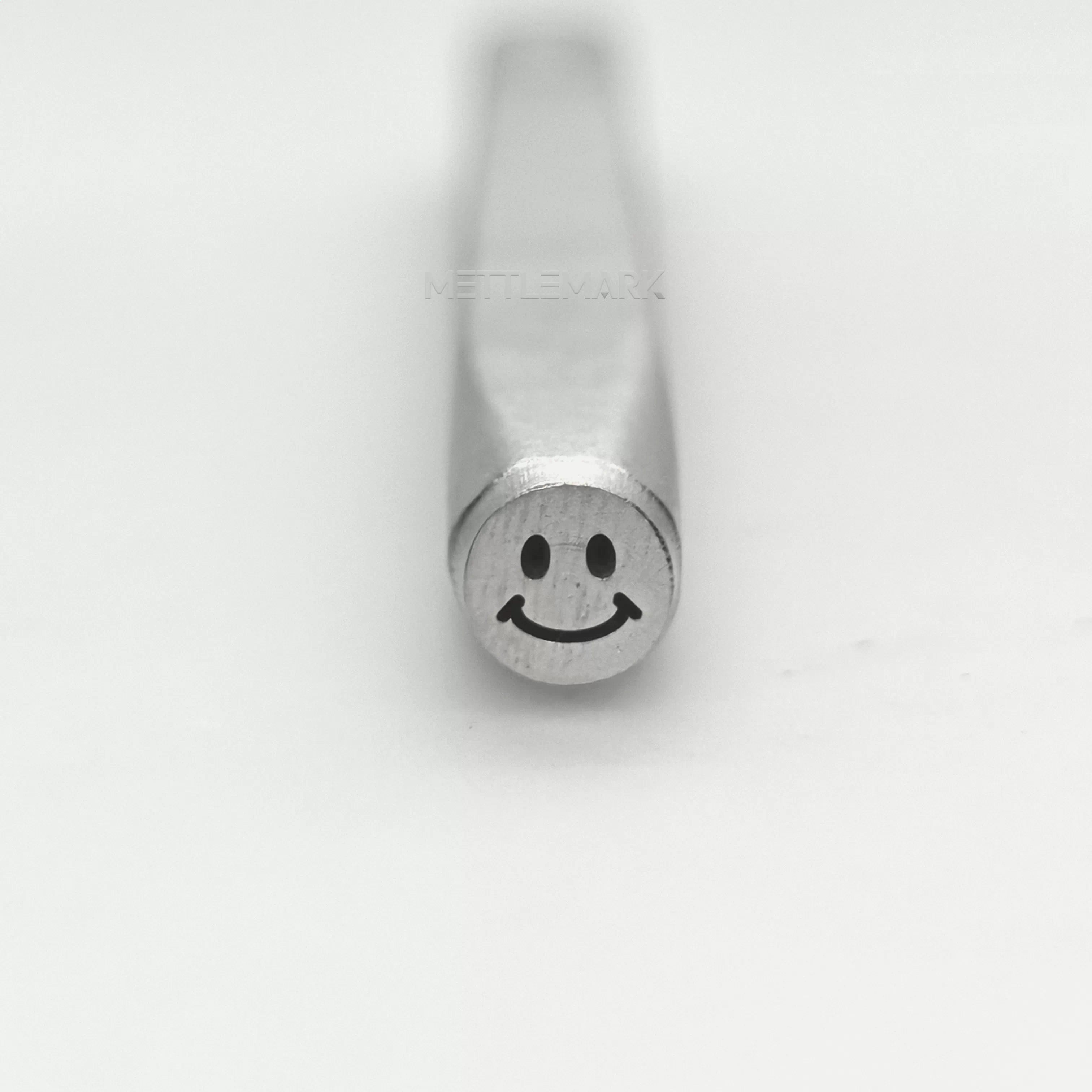 Metal stamping tool with Smiley face