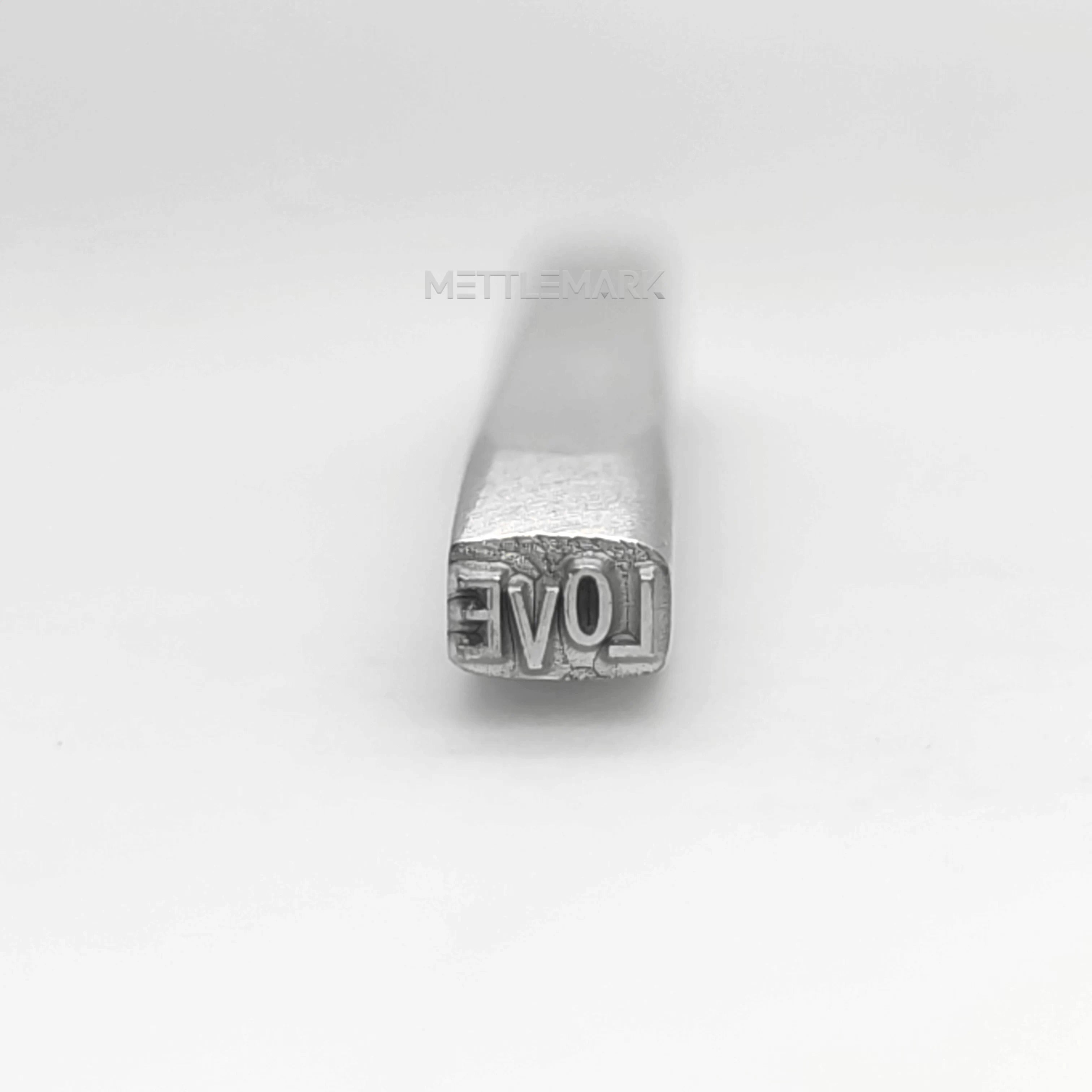 Metal stamping tool with Text love