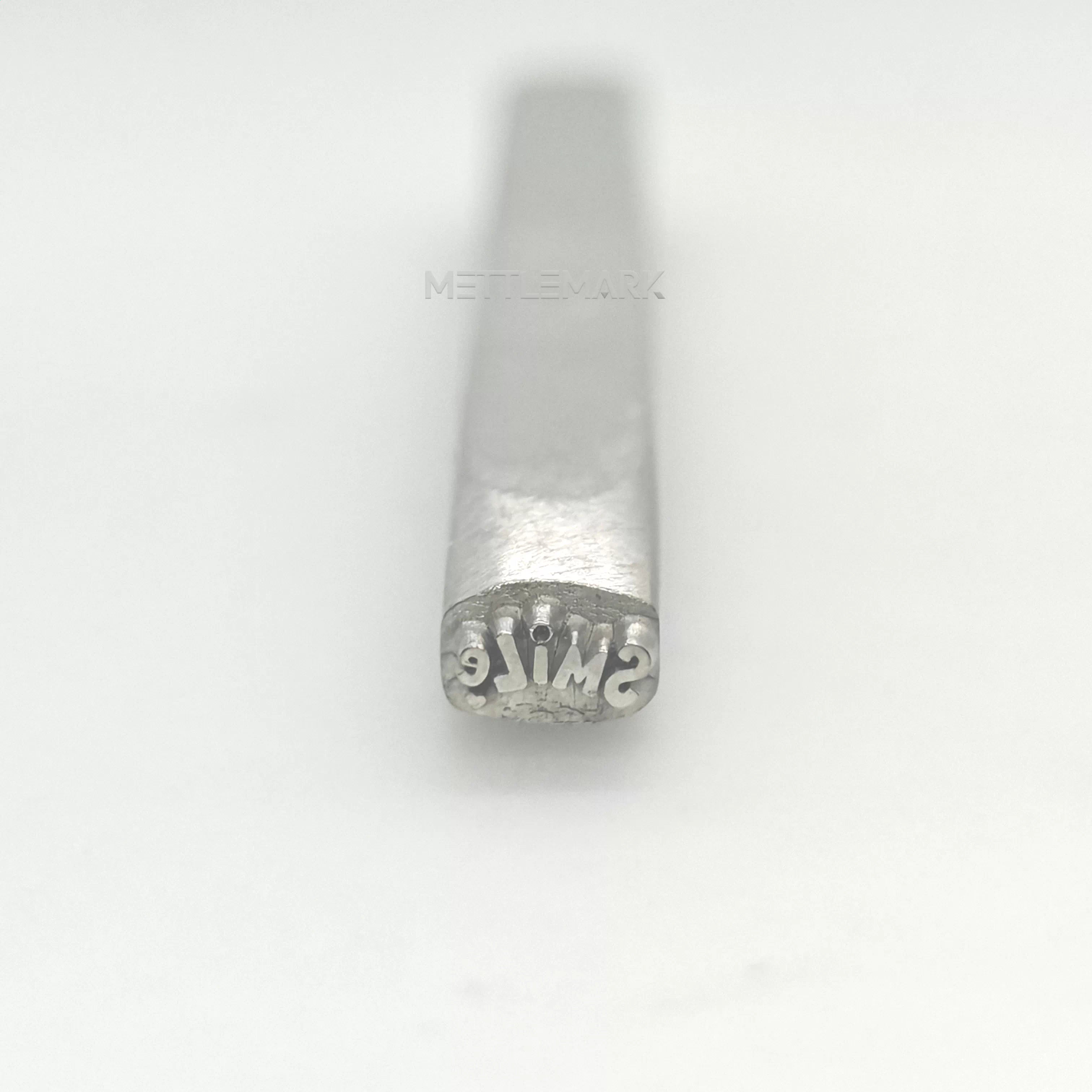Metal stamping tool with Text smile