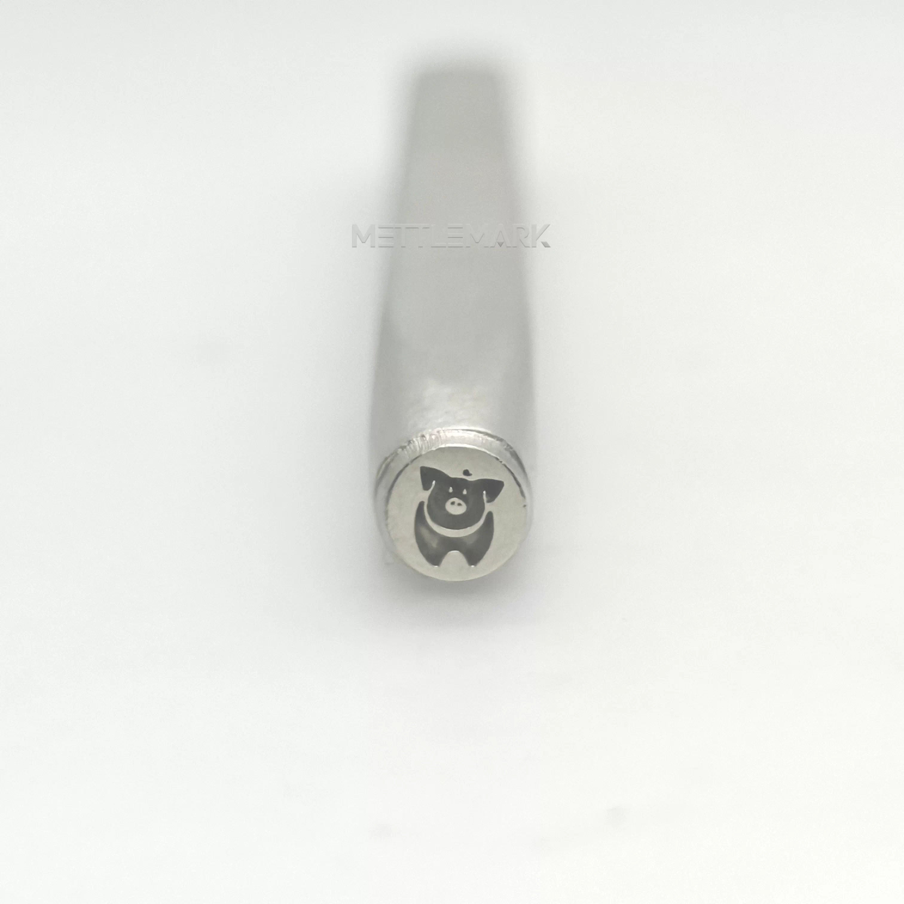 Metal stamp with a pig design