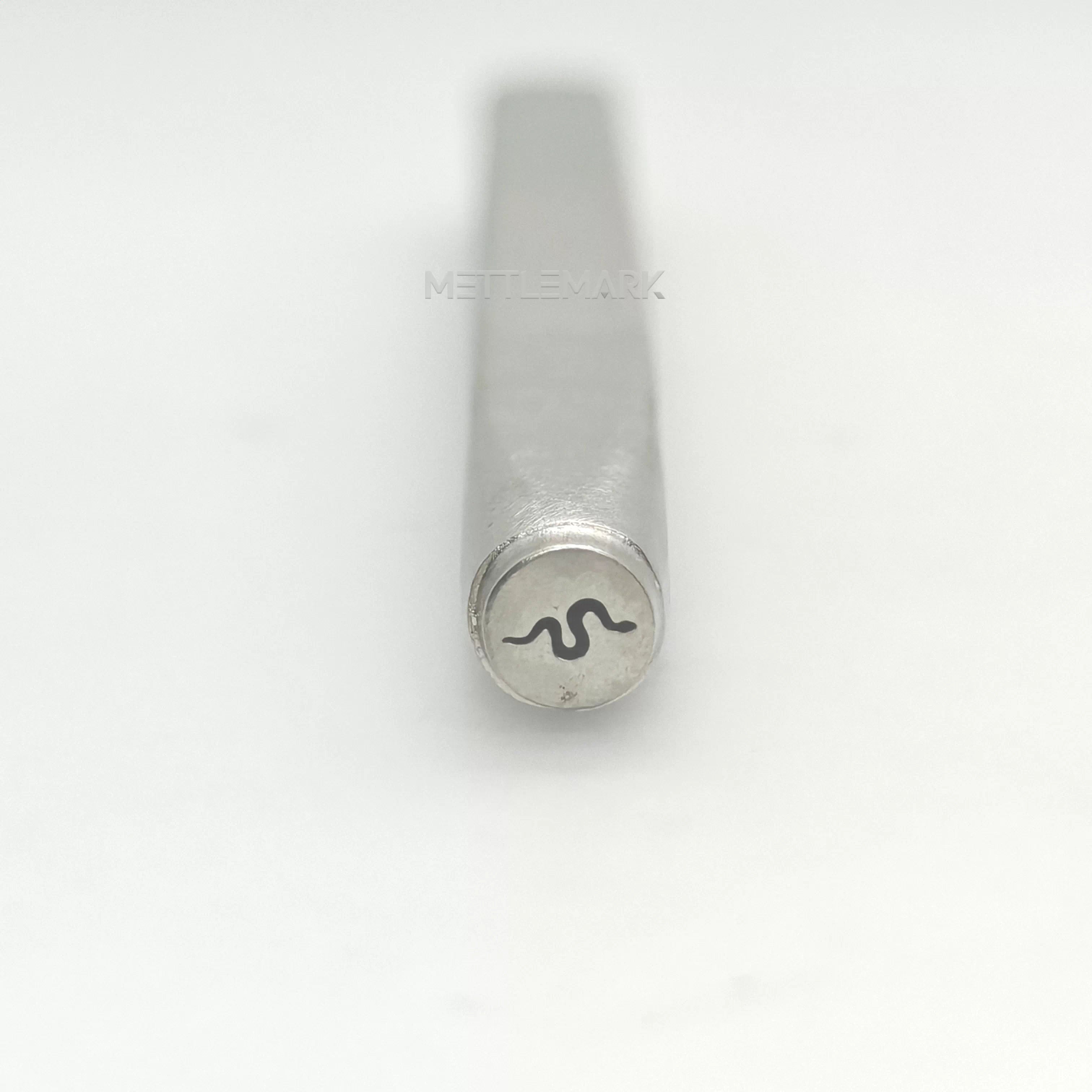 Metal stamp with a snake design