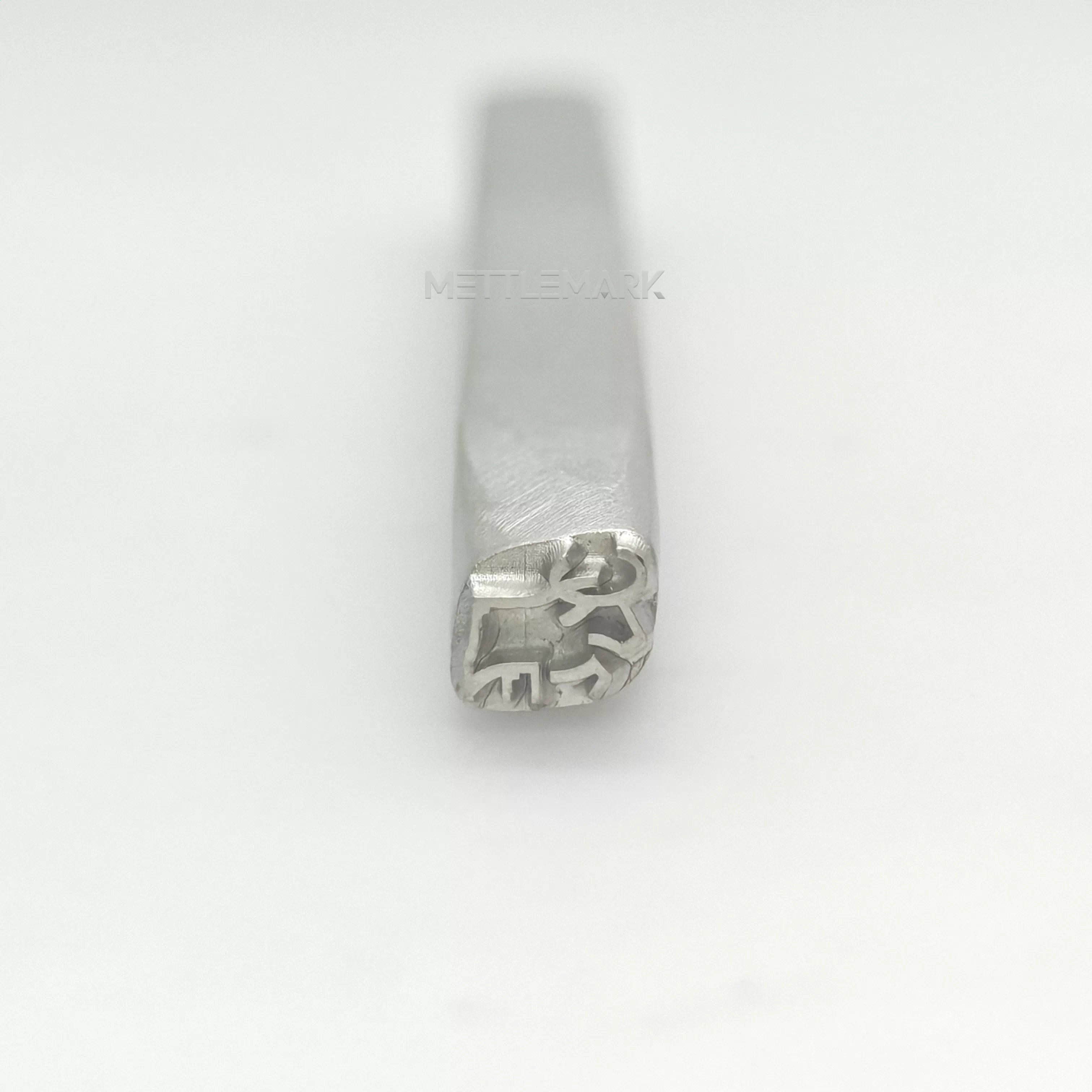 Metal stamp with a ox design