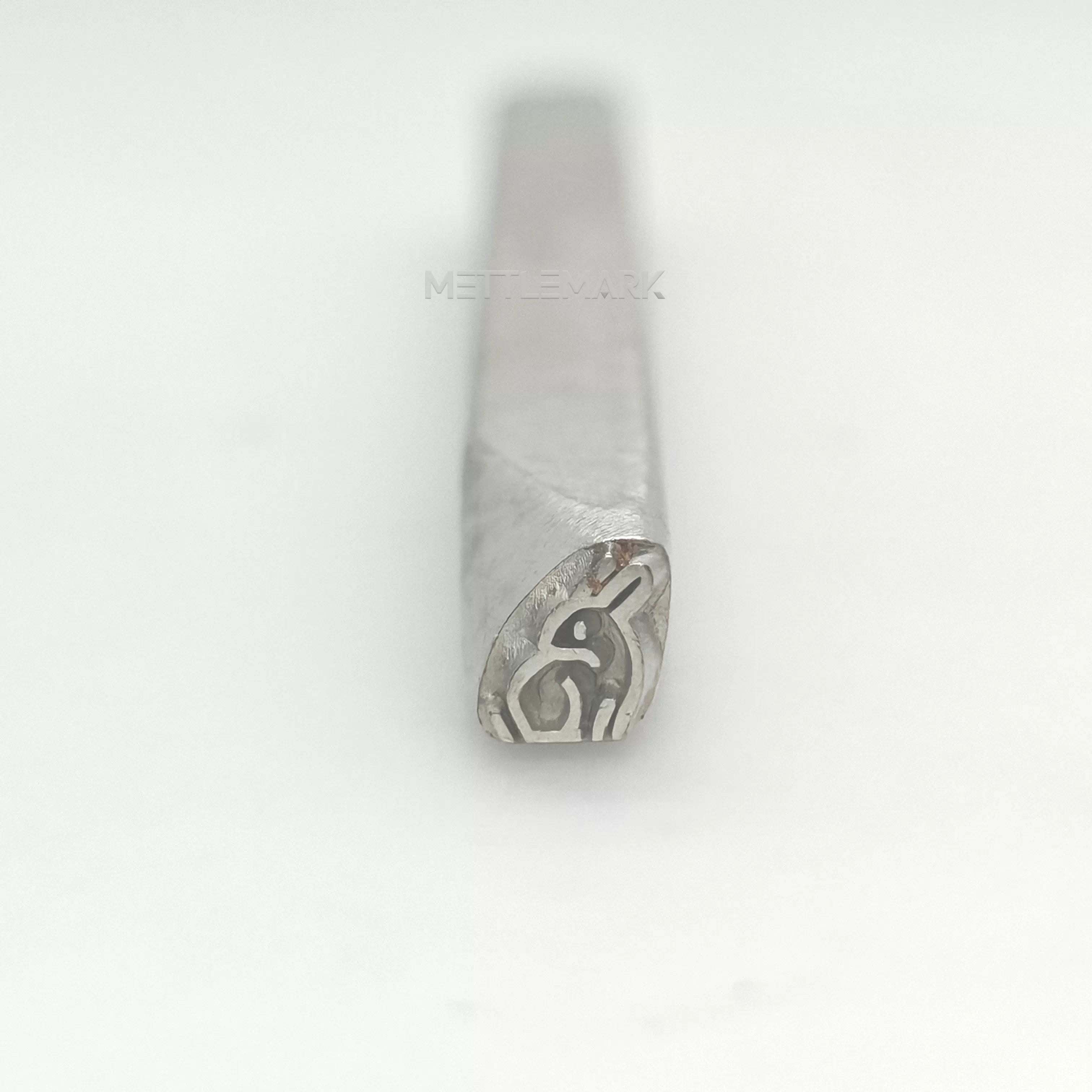 Metal stamp with a rabbit design