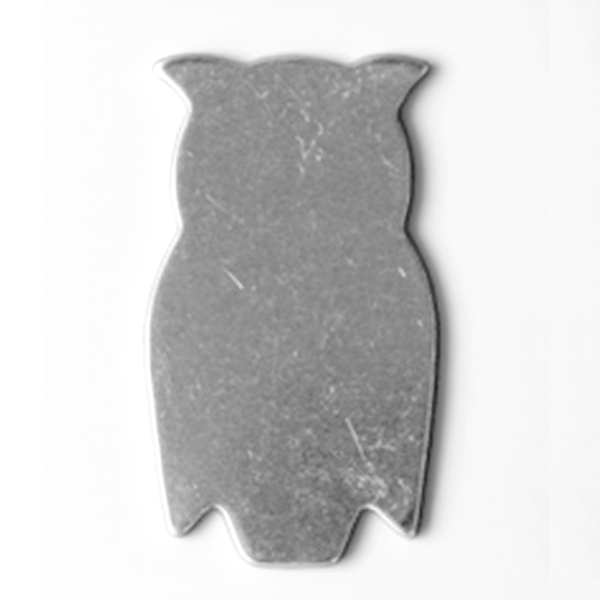Gray owl-shaped object on a white background MetalStampingBlank
