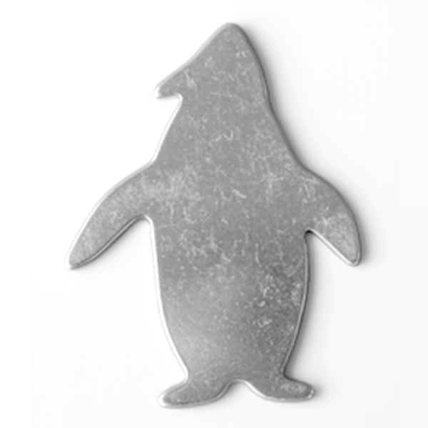 Metallic penguin-shaped object on a white background MetalStampingBlank