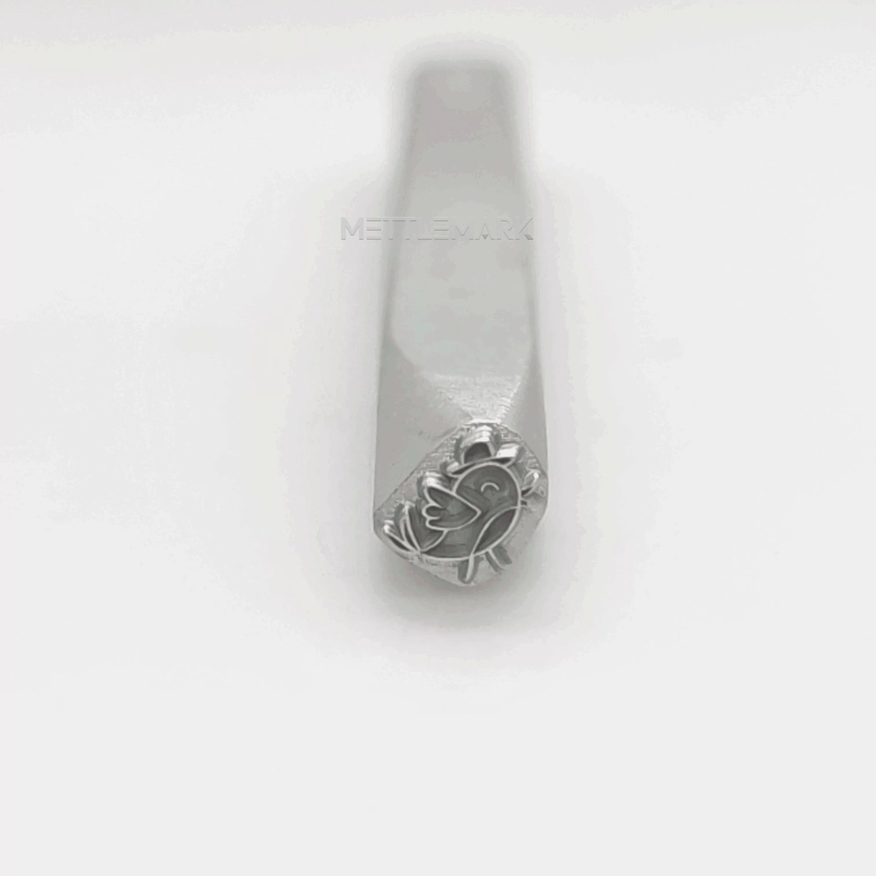Metal stamping tool with cartoon bird
