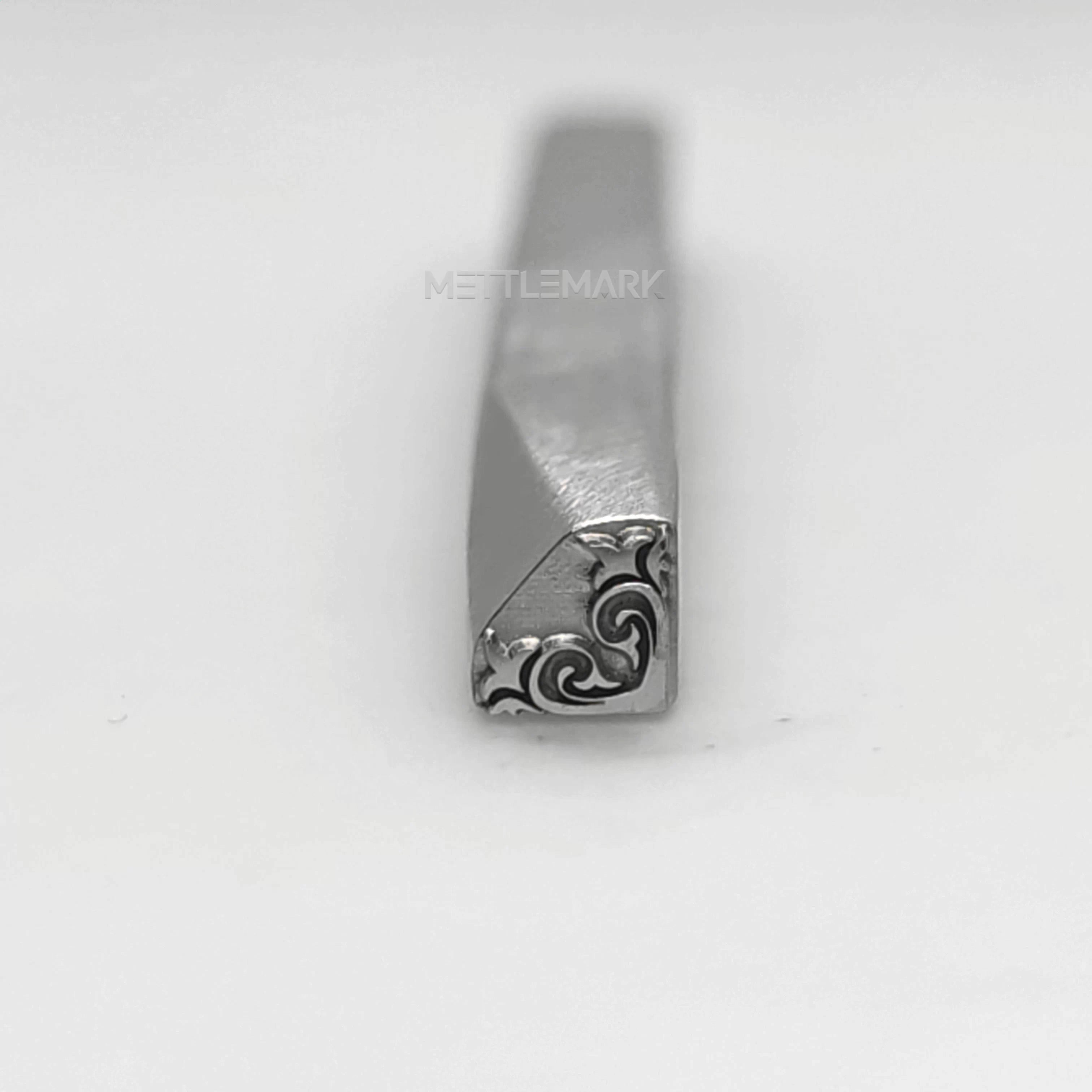 Metal stamping tool with etalStampBordersRightAngleDecoration