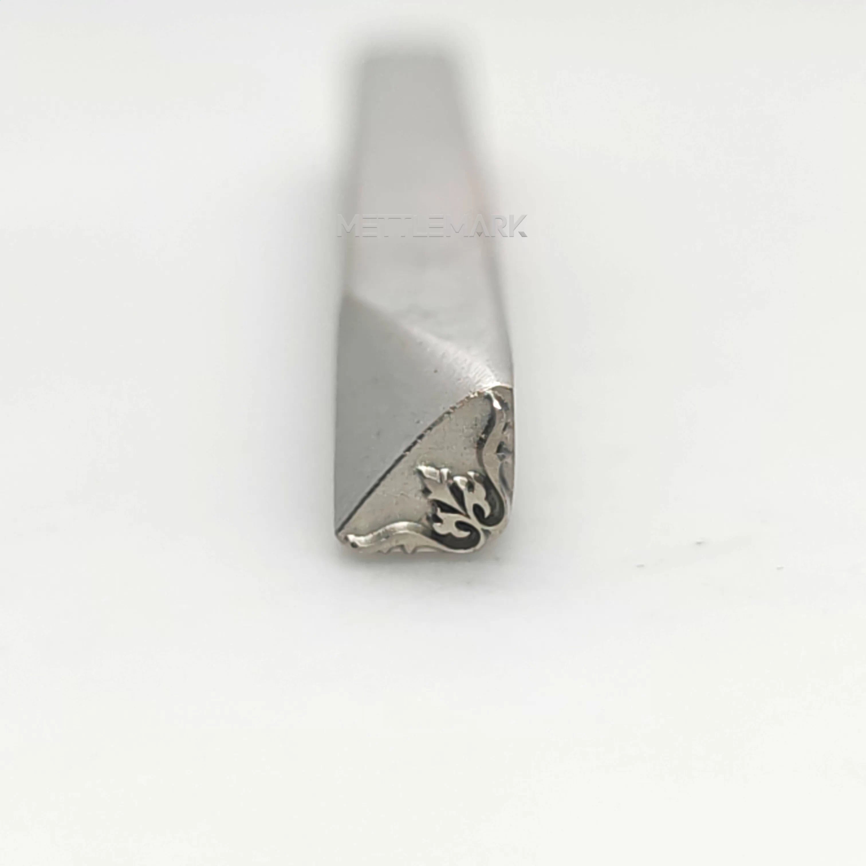 Metal stamping tool with etalStampBordersRightAngleDecoration