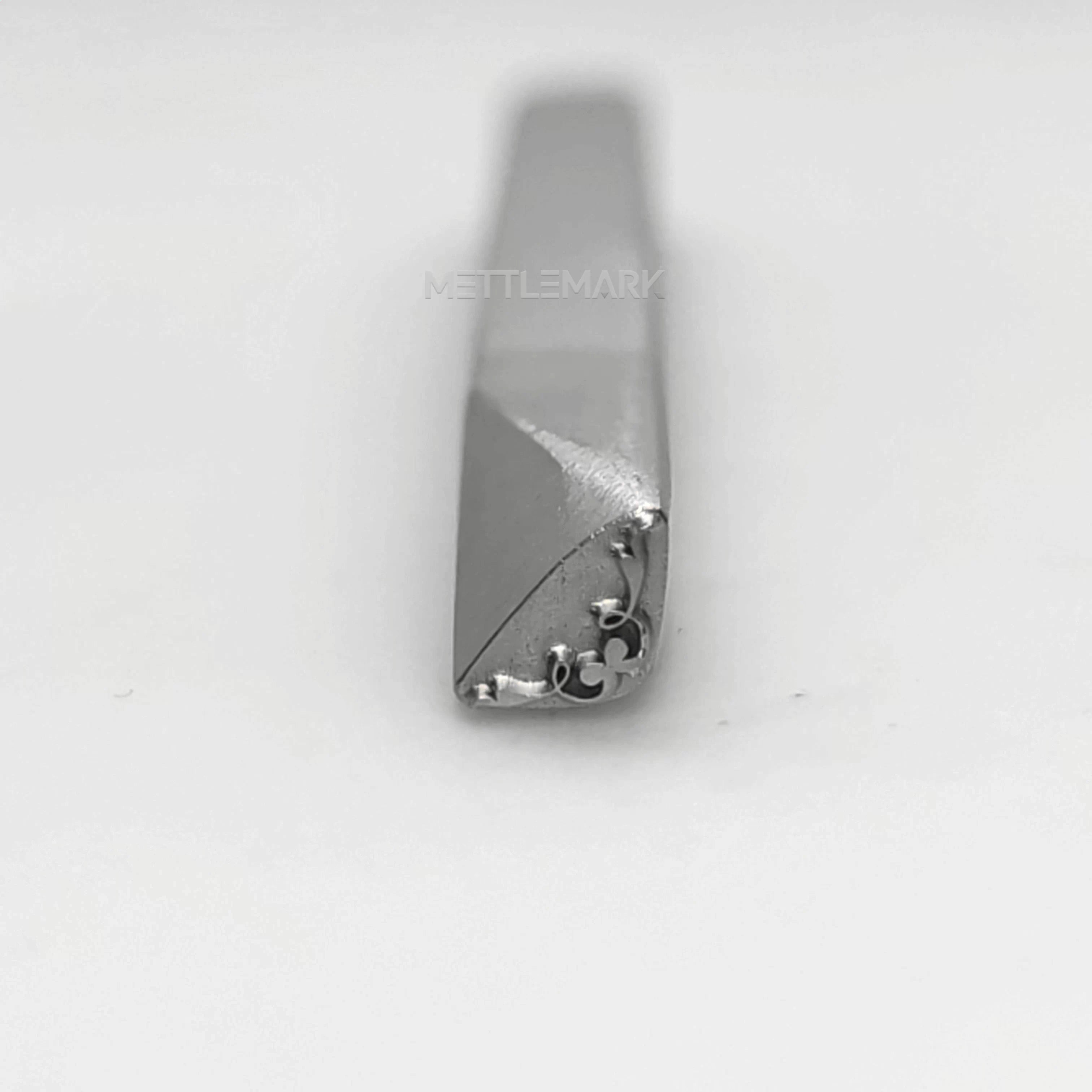 Metal stamping tool with etalStampBordersRightAngleDecoration