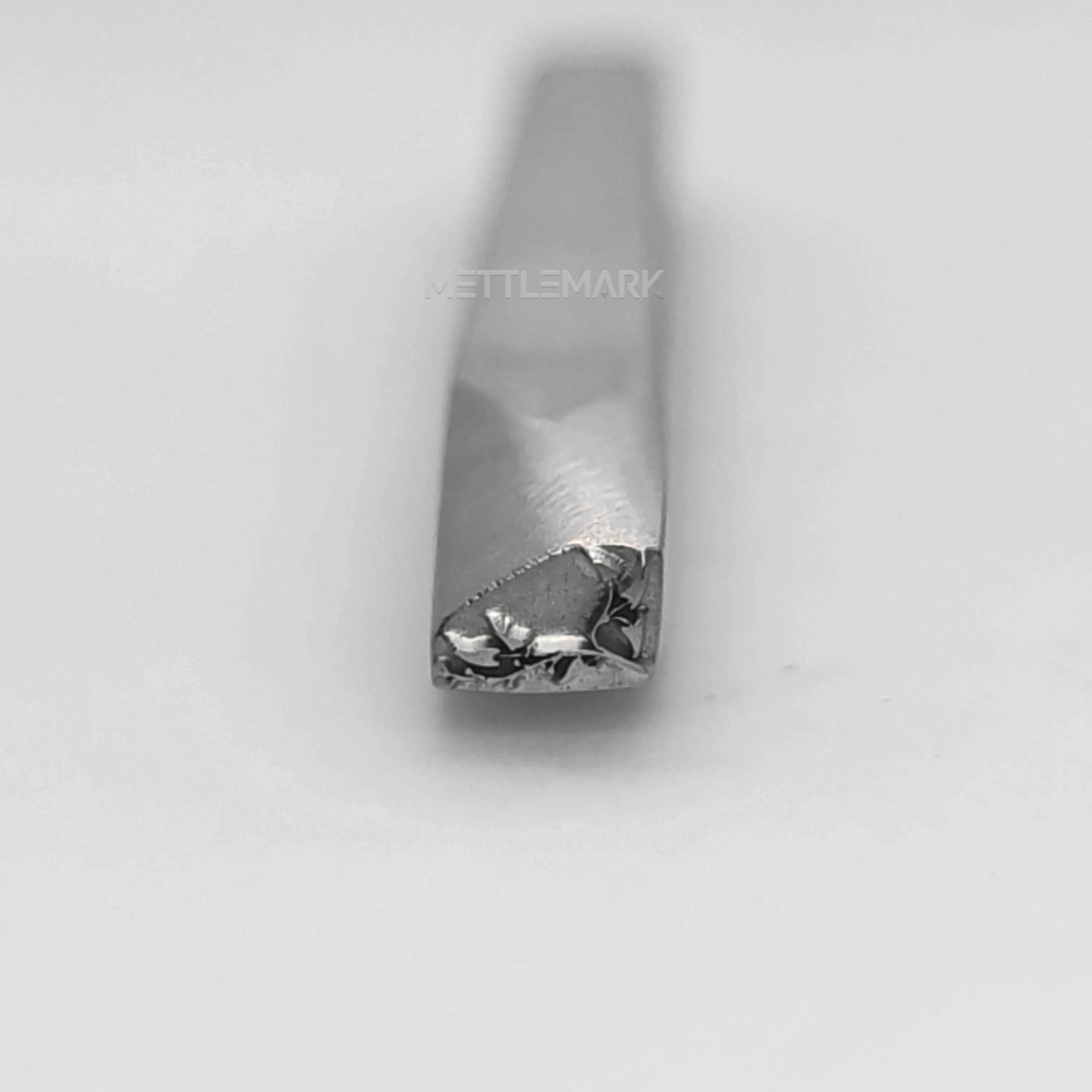 Metal stamping tool with etalStampBordersRightAngleDecoration