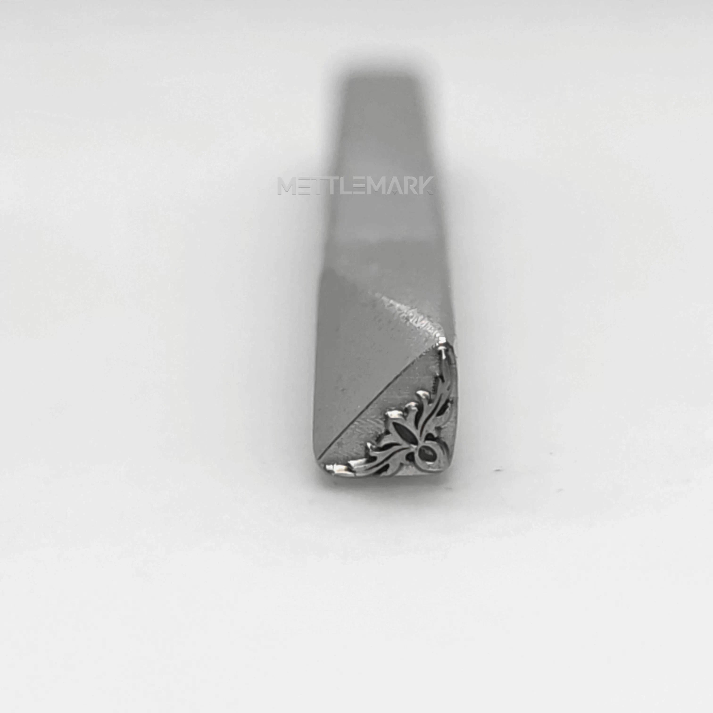 Metal stamping tool with etalStampBordersRightAngleDecoration