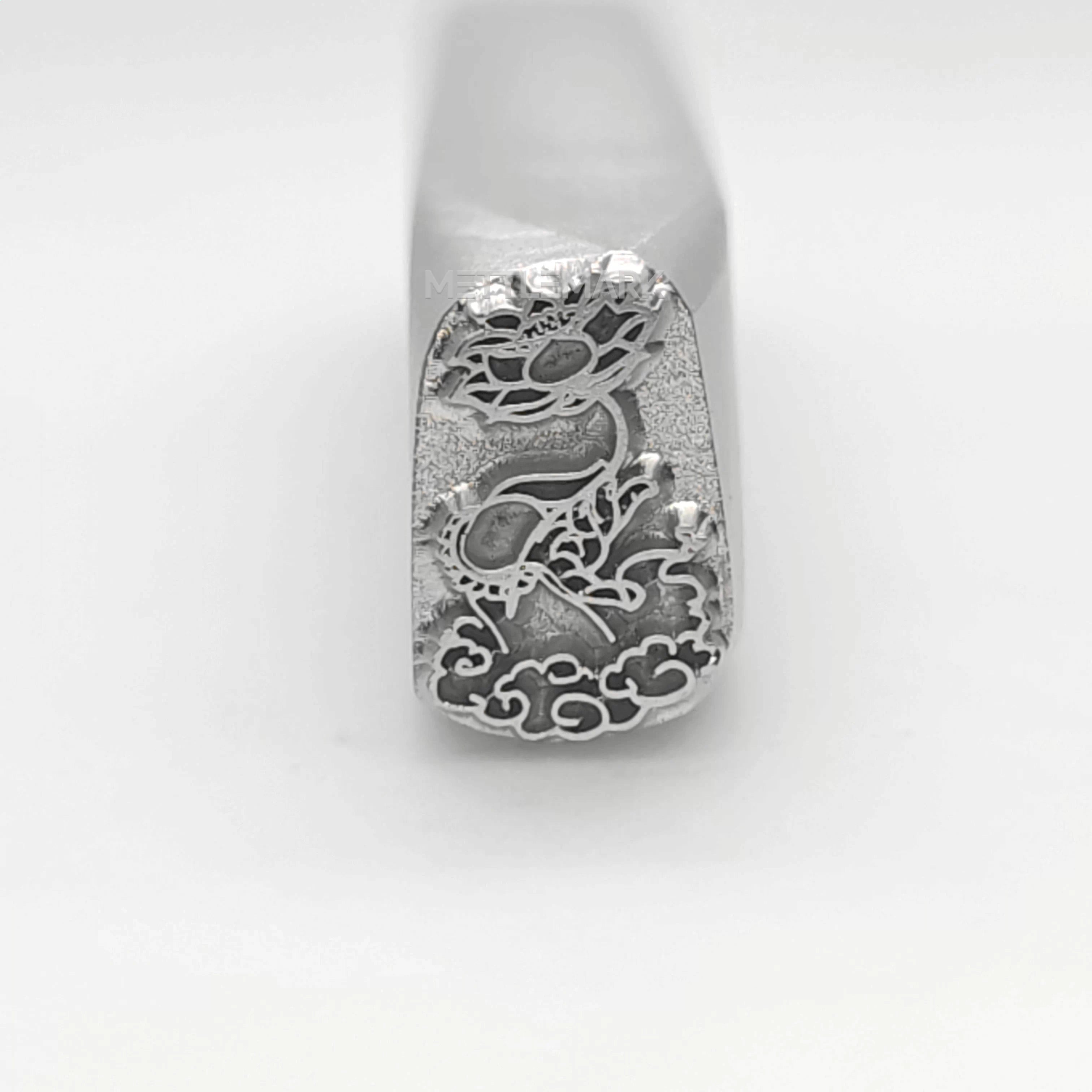 Metal stamp with Holding a lotus flower