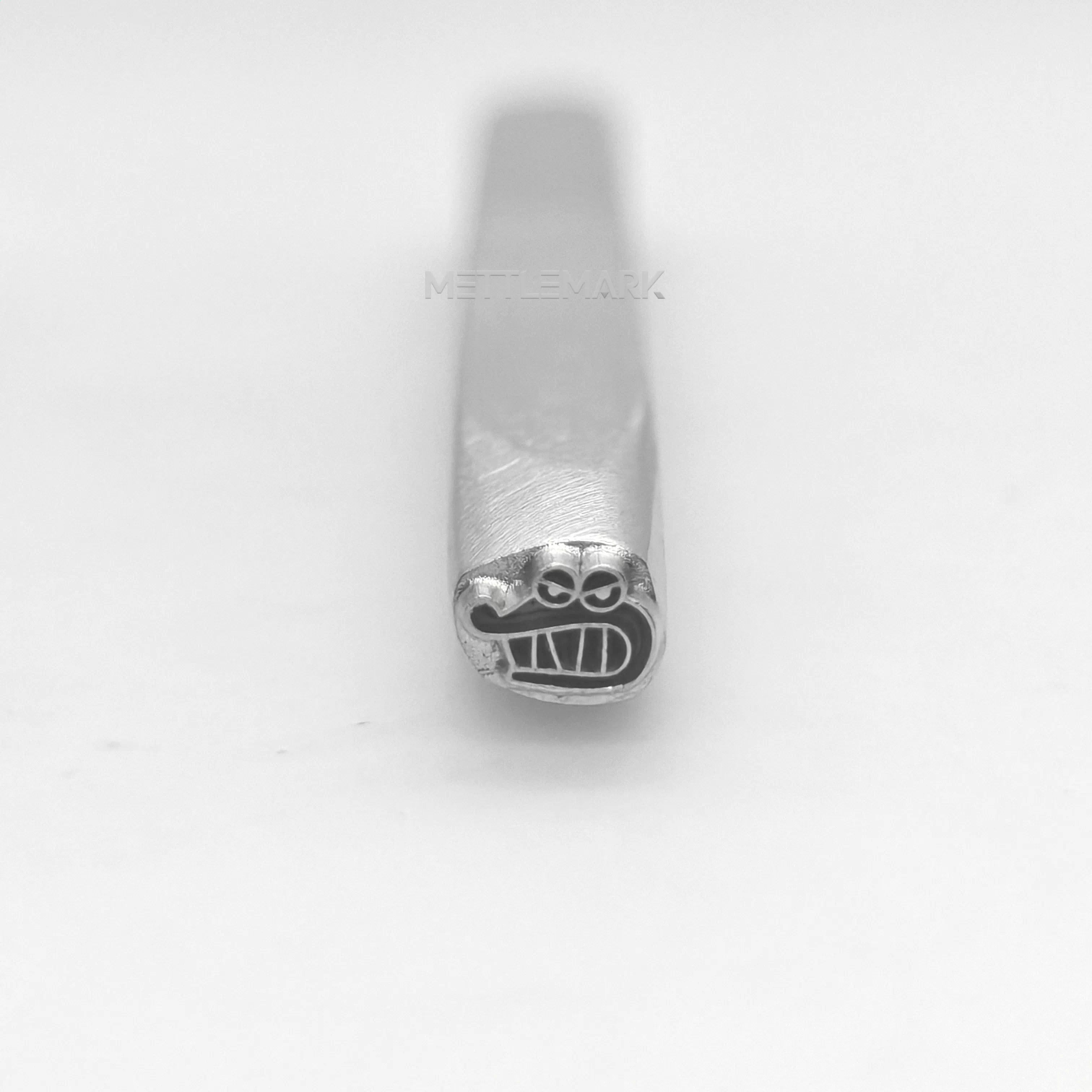 Metal stamping tool with Cartoon GrinningLittleCrocodile