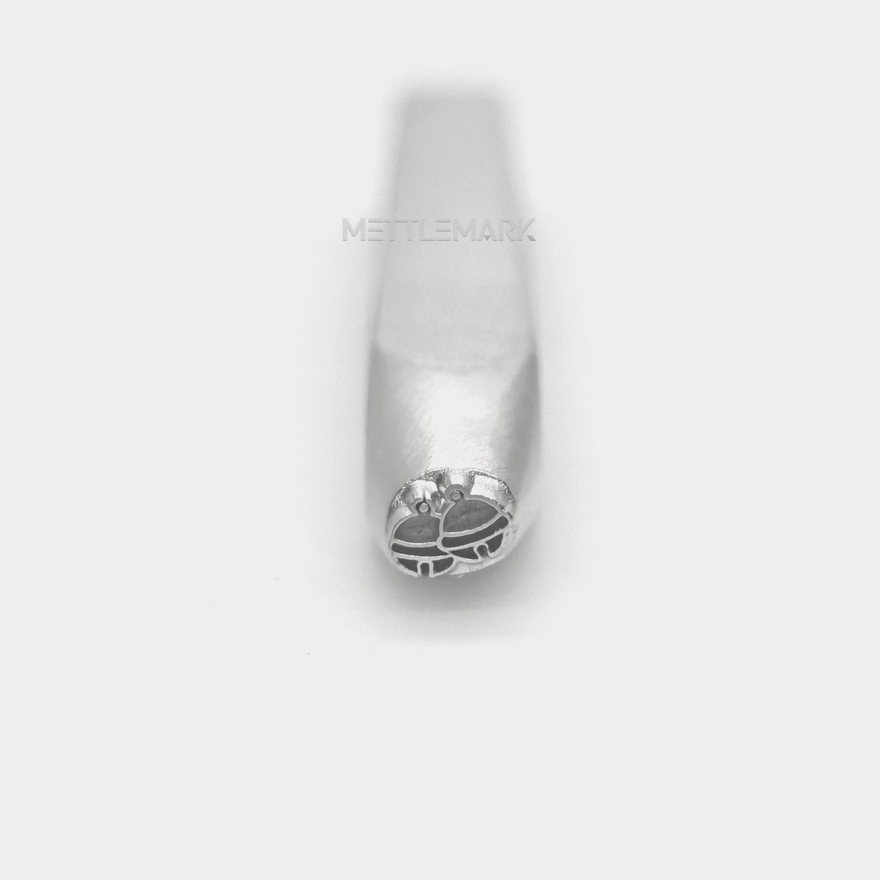Metal stamping tool with bell
