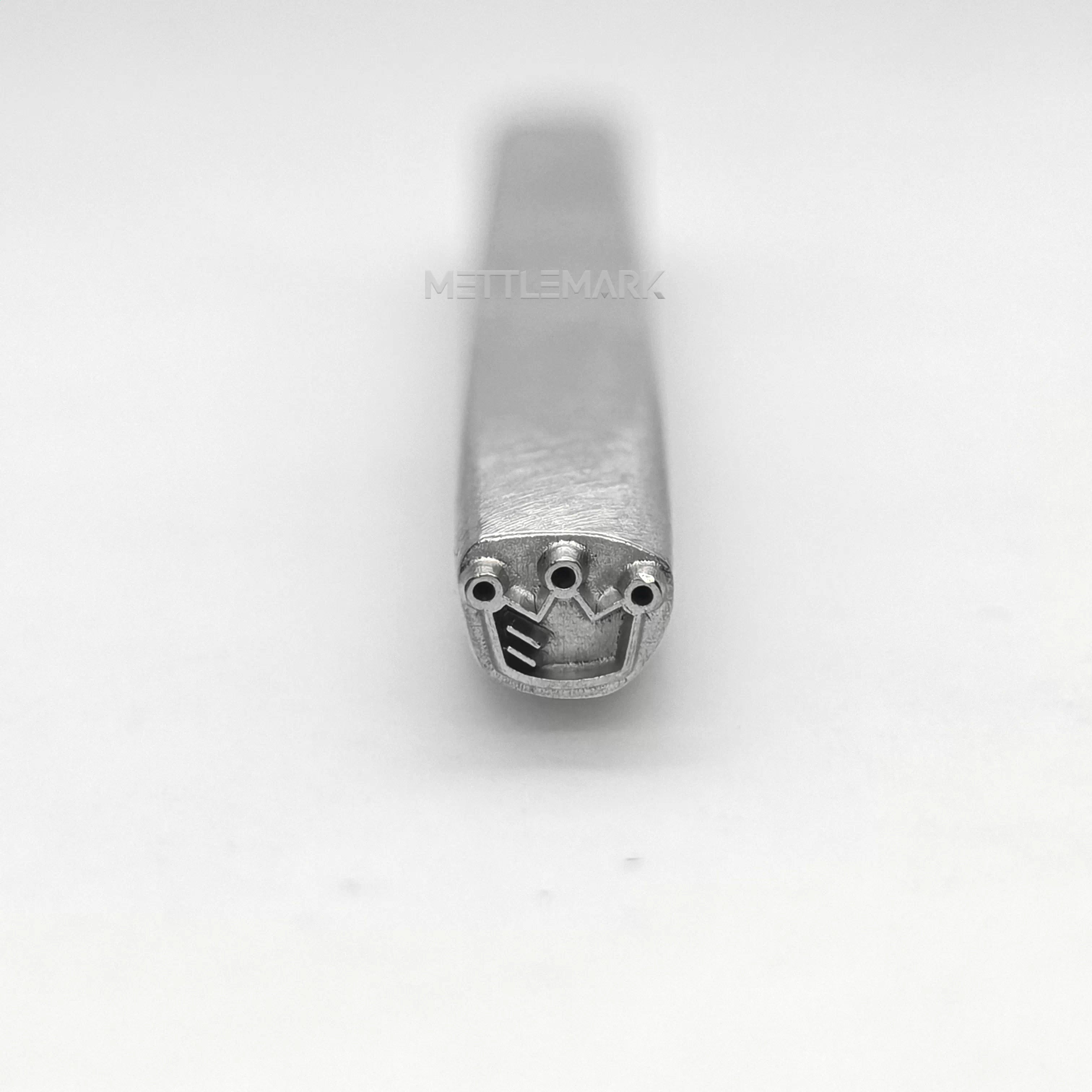 Metal stamping tool with CrownCrown