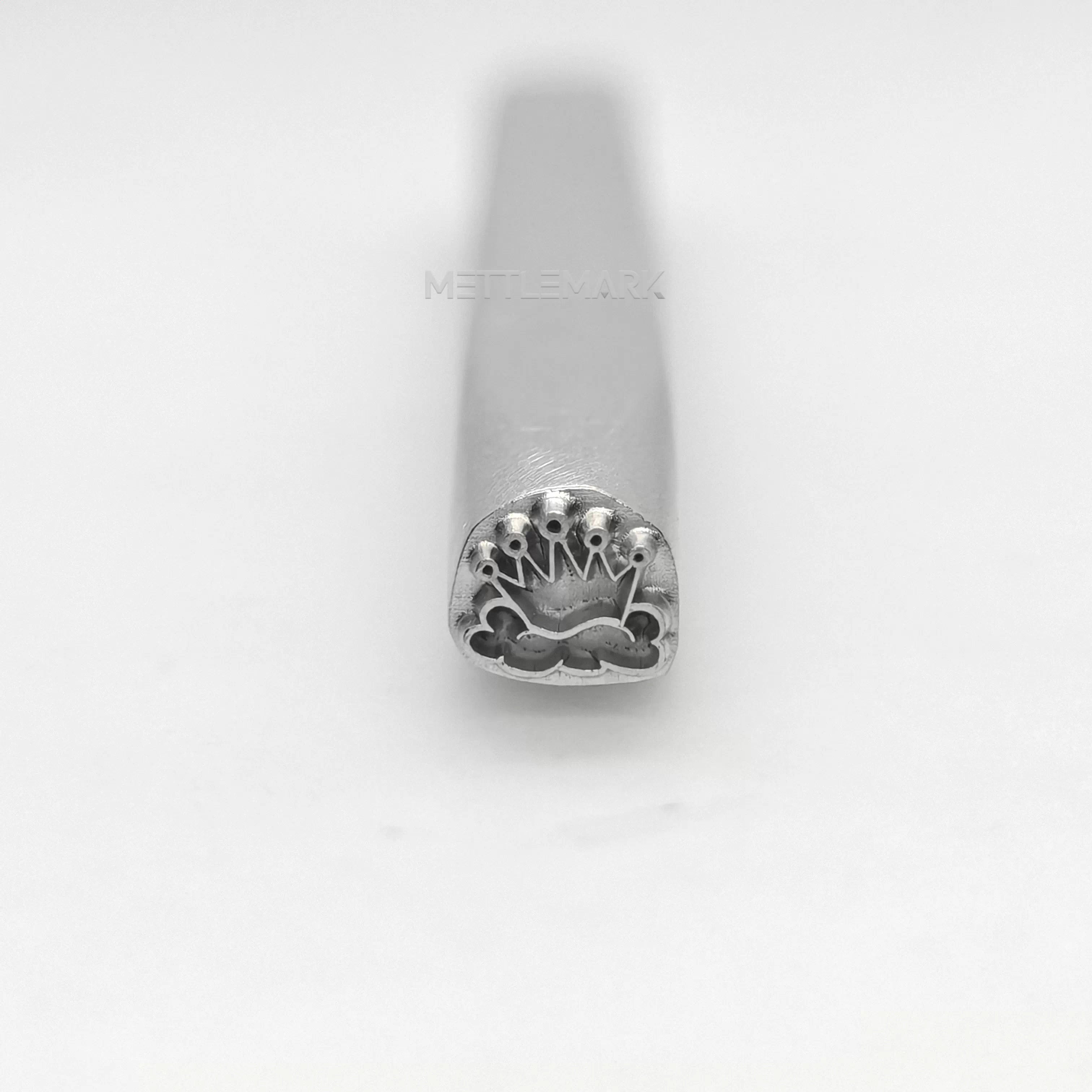 Metal stamping tool with CrownCrown
