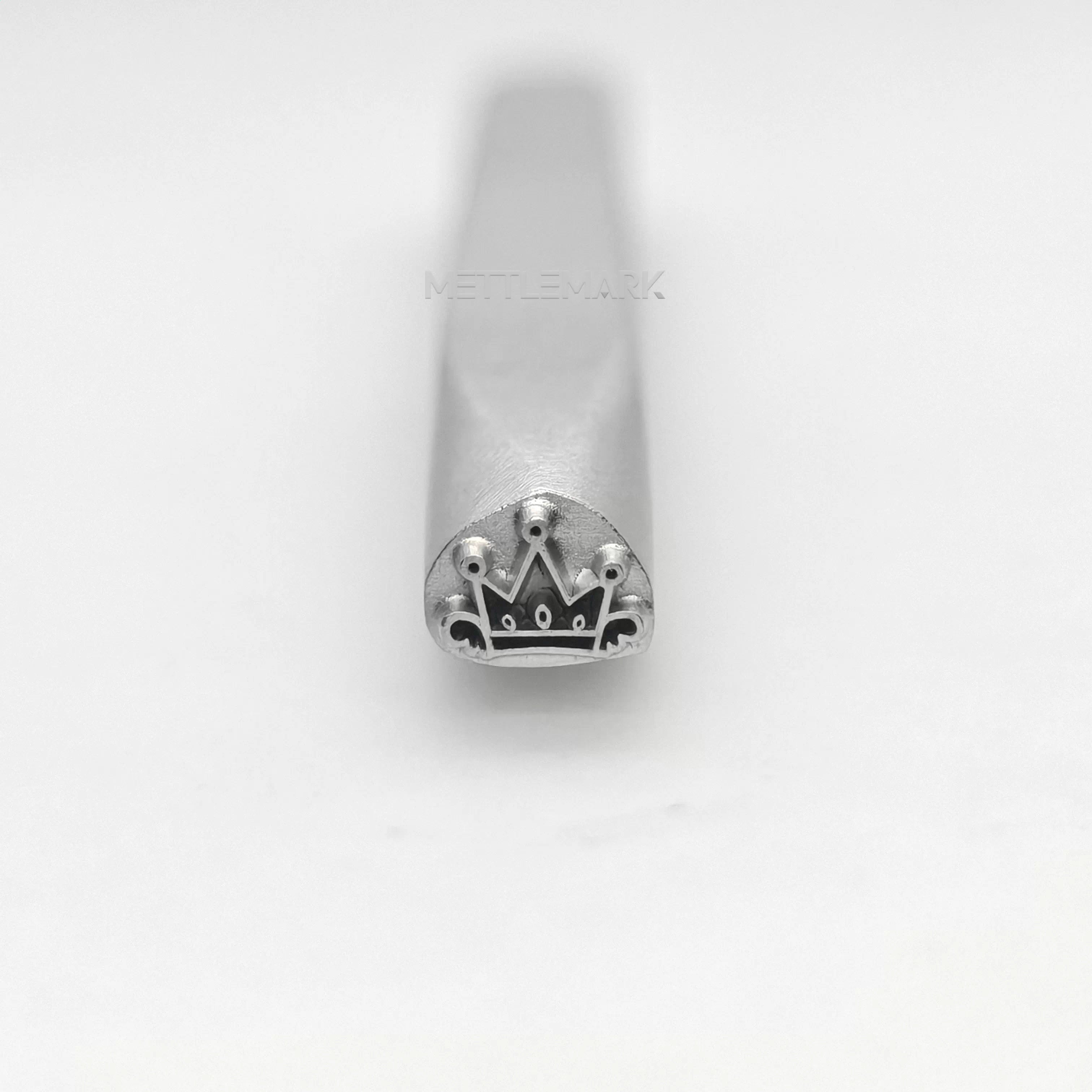 Metal stamping tool with CrownCrown