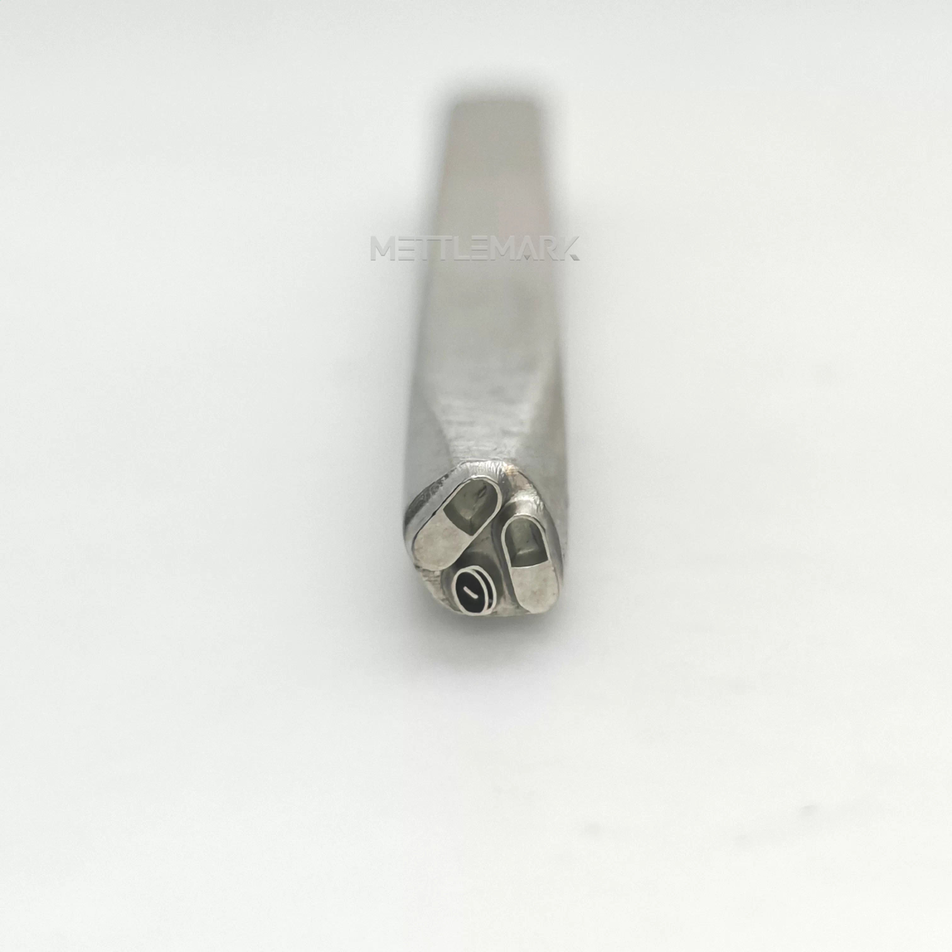 Metal stamp with a pill