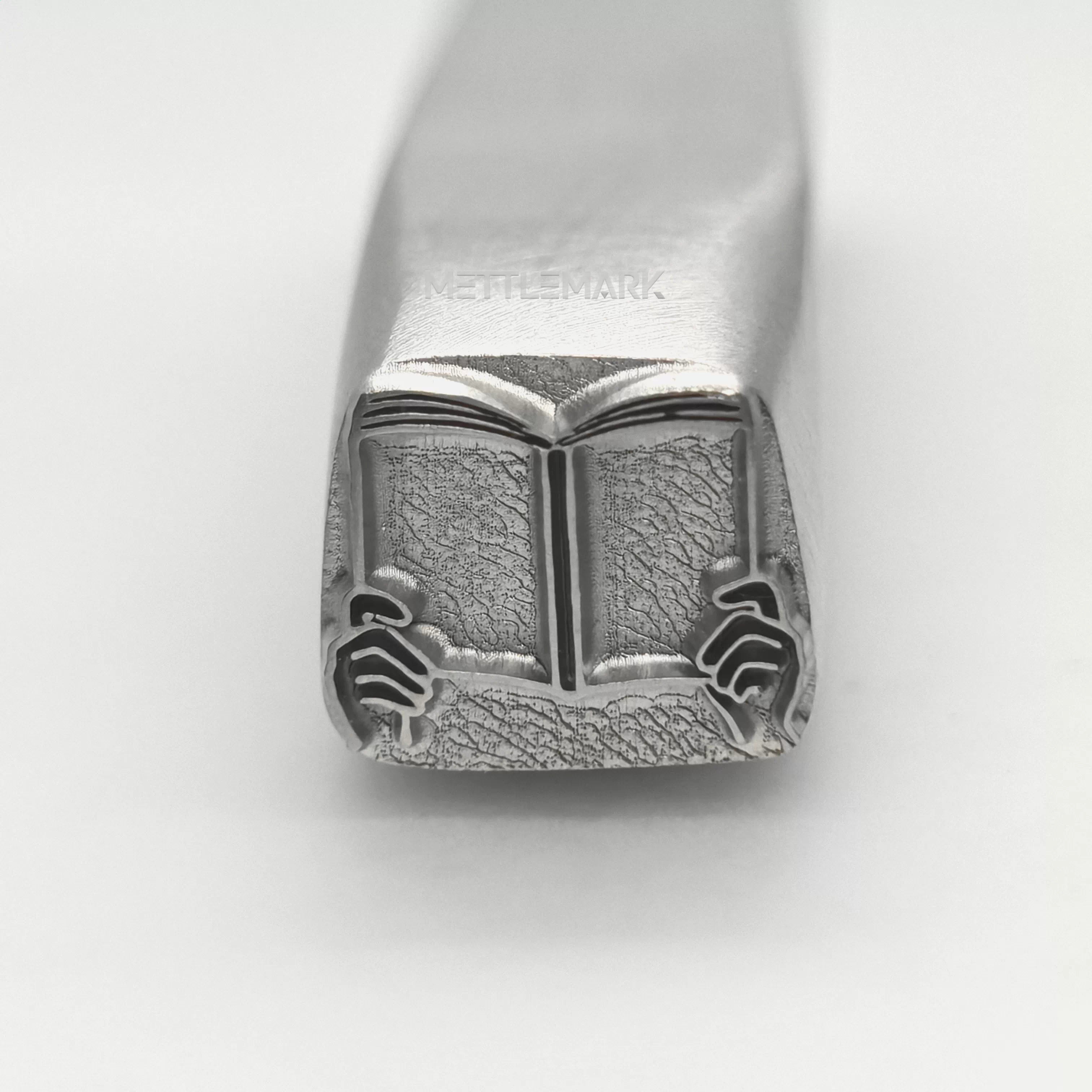 Metal stamp with a Reading