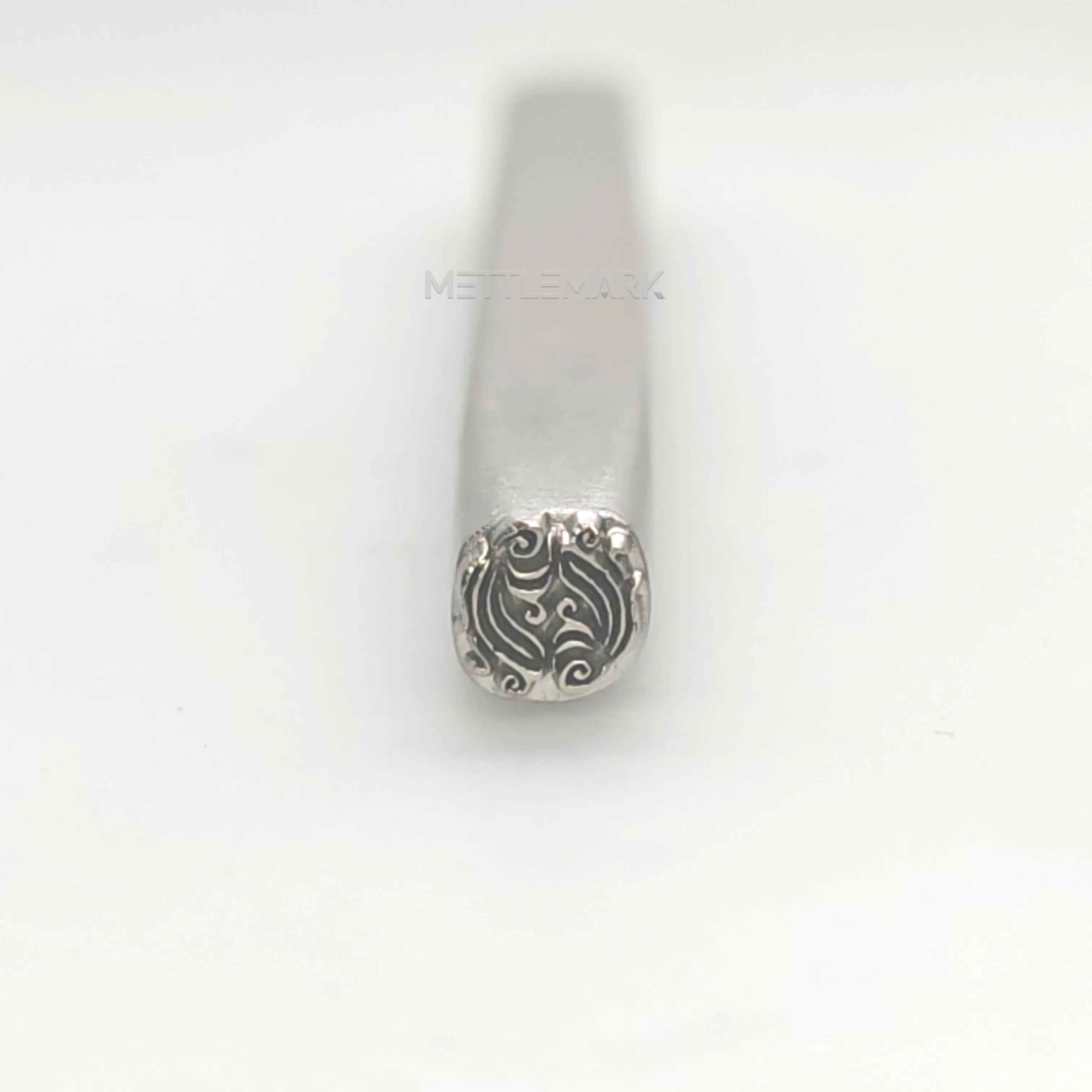 Metal stamping tool with SymbolsAbstract