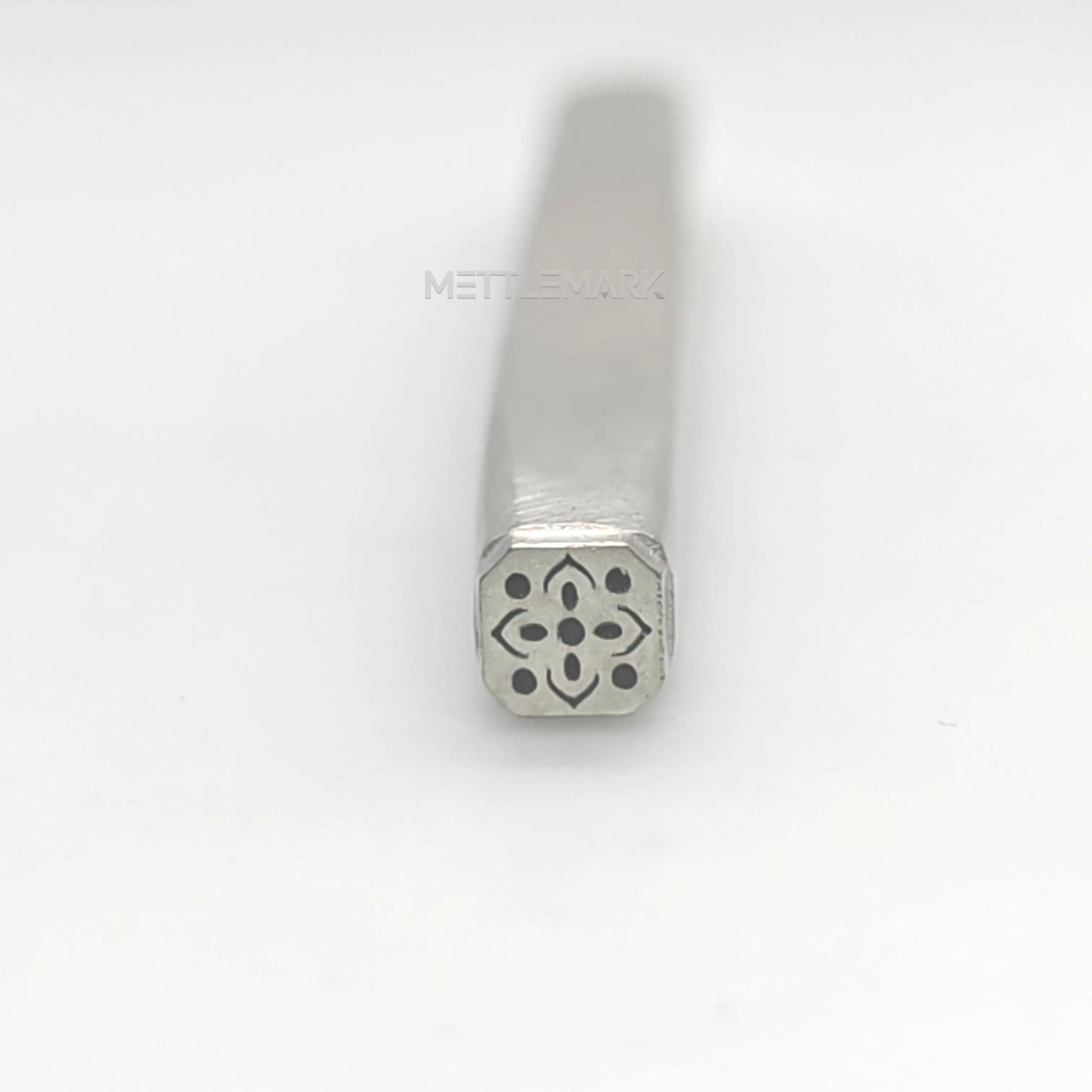 Metal stamping tool with SymbolsAbstract