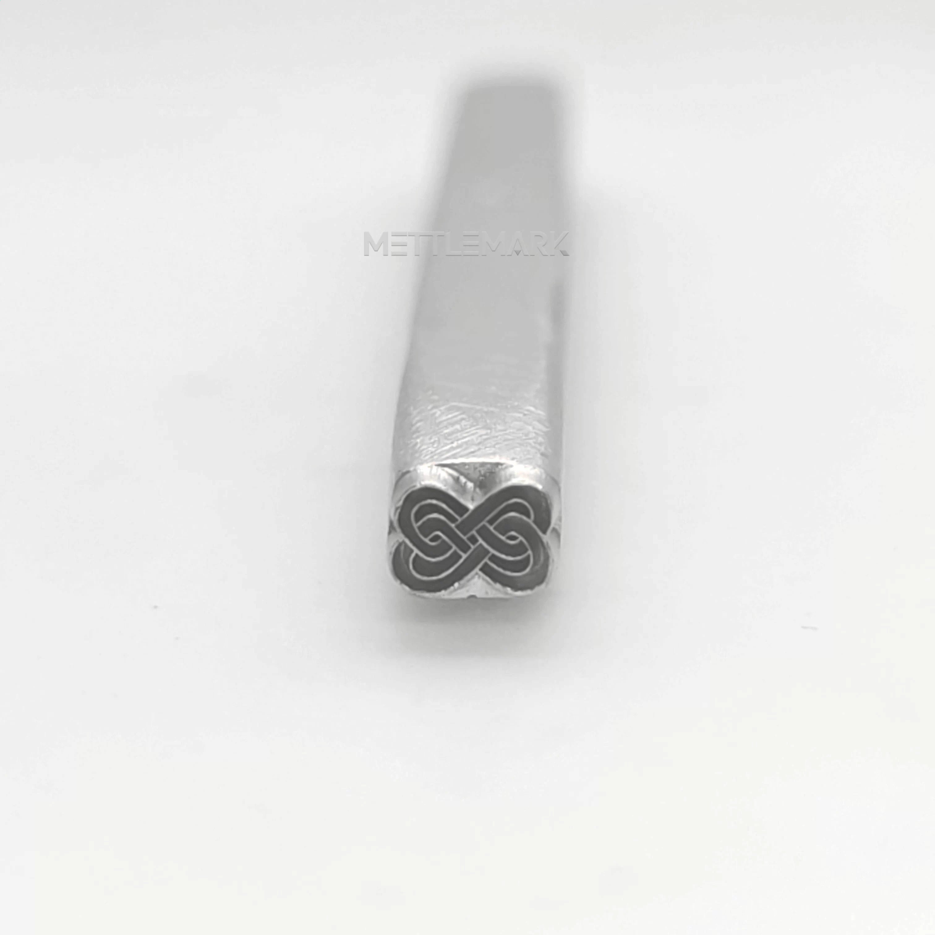 Metal stamping tool with SymbolsAbstract